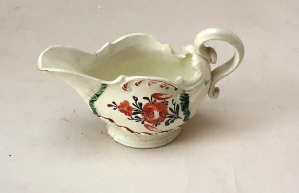 Small Creamware Moulded Sauceboat with Floral Decoration